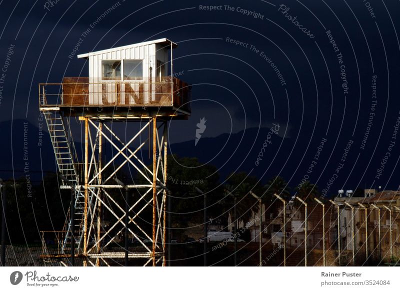 14 Feb 2020 - Nicosia, Cyprus: United Nations guard tower at the border zone "Green Line" in Nicosia, Cyprus barbed wire barrier closed closeup concept conflict