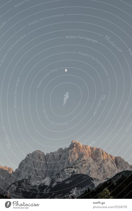 Mountain panorama at dusk with moon Mountaineering Mountain range Slovenia triglav Triglav National Park Moon Moonlight Twilight Landscape Exterior shot Nature