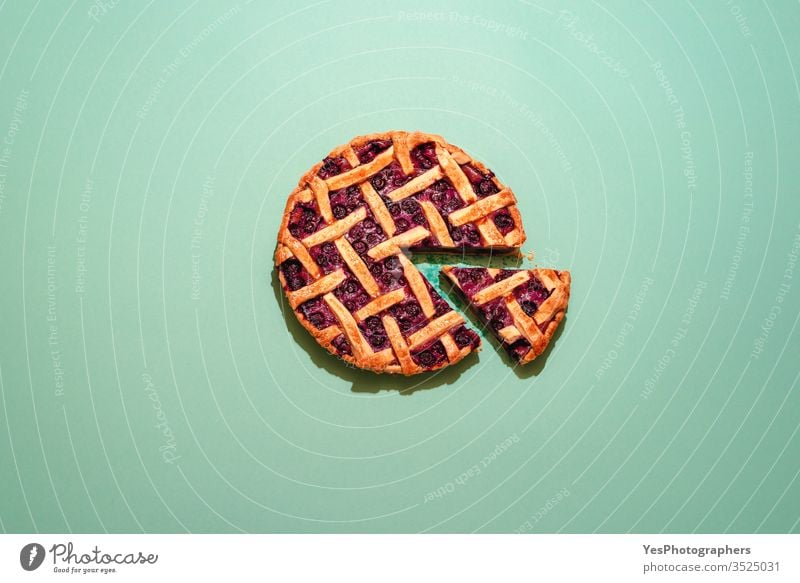 Blueberries pie with lattice crust top view on a green background. american food baked bakery bilberry blueberries blueberry pie cake canadian cuisine christmas