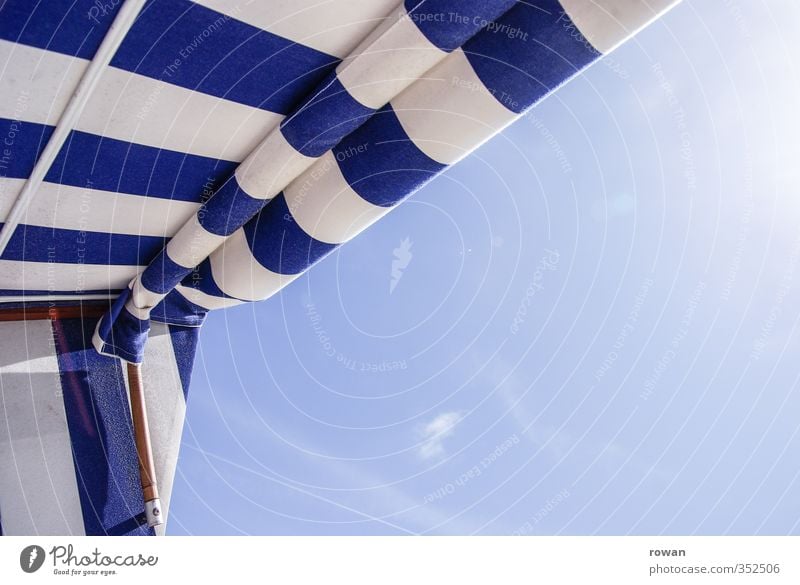 Relax Cloudless sky Warmth Sunlight Sunbeam Beach chair Stripe Striped Blue North Sea East Frisland Relaxation Beach vacation Vacation & Travel Colour photo