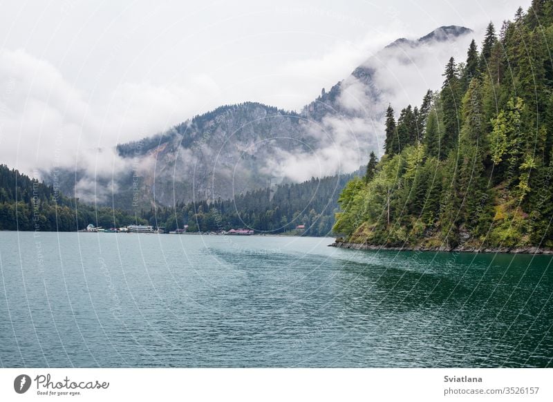 Blue Lake Ritsa in Abkhazia. Beautiful landscape abkhazia ritsa lake beautiful outdoor view park peak pond scenic summer tourism travel tree rock nature water