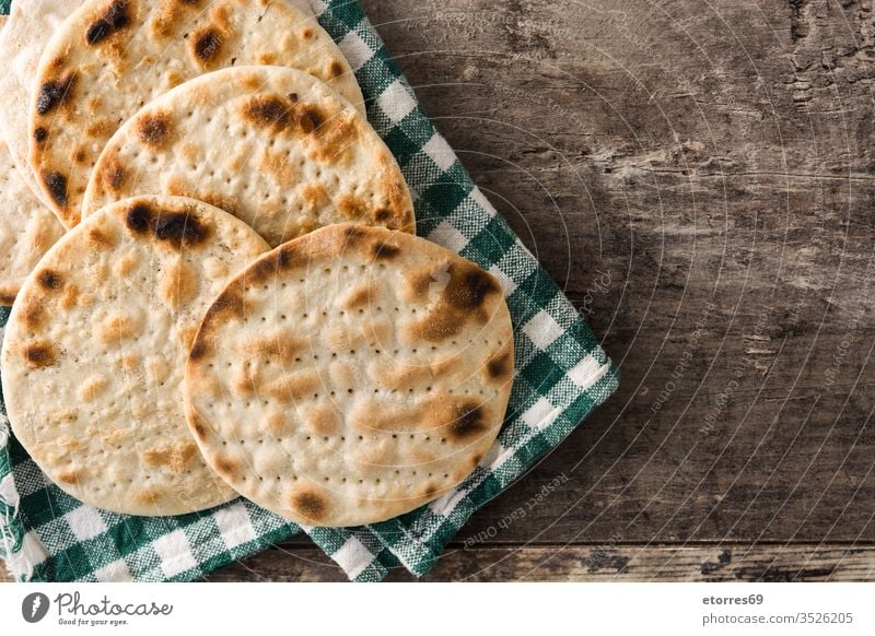 Handmade matzah for Jewish Passover on wooden table. Copy space background baked bread celebration culture dough food handmade hebrew holiday homemade israel