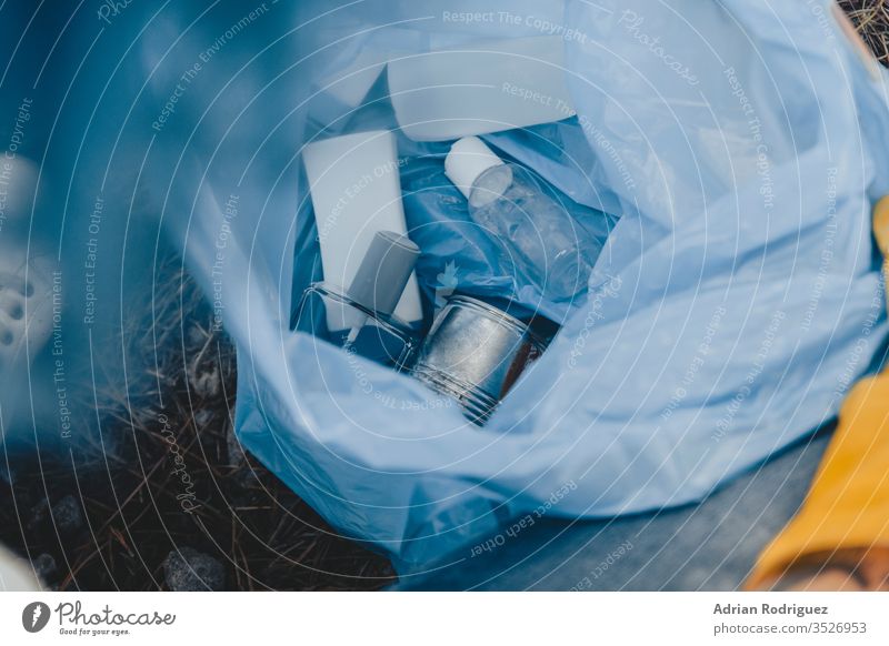 High angle shot of a plastic garbage bag with recyclable bottles - environmental pollution concept trash waste rubbish ecology recycling recycle dump background