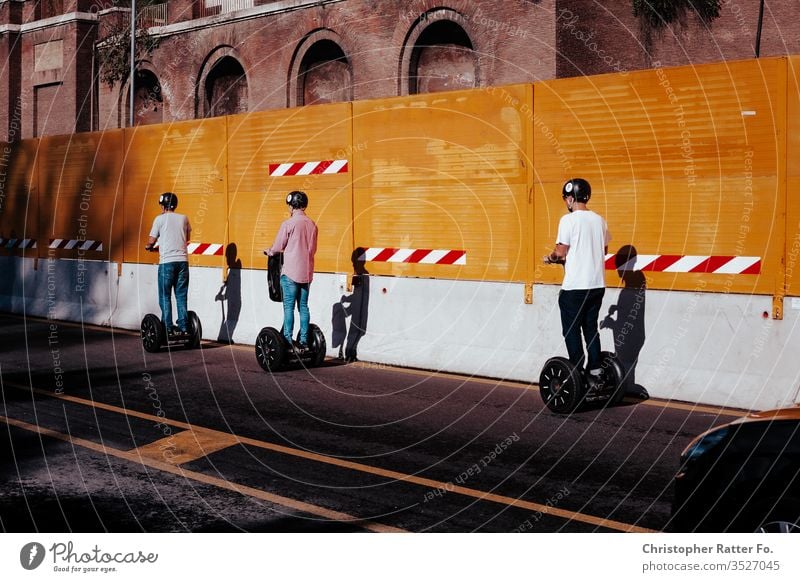 Three scooter riders drive through Rome voyage Italy Tourism Vacation & Travel Exterior shot Serene Destination Travel photography South Colour photo Card