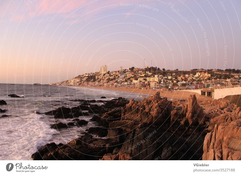 coast, in the foreground rocks in the background houses, white water, beach seascape Picturesque Sea coast bank Water travel Calm Town Tourism Ocean Blue Bay