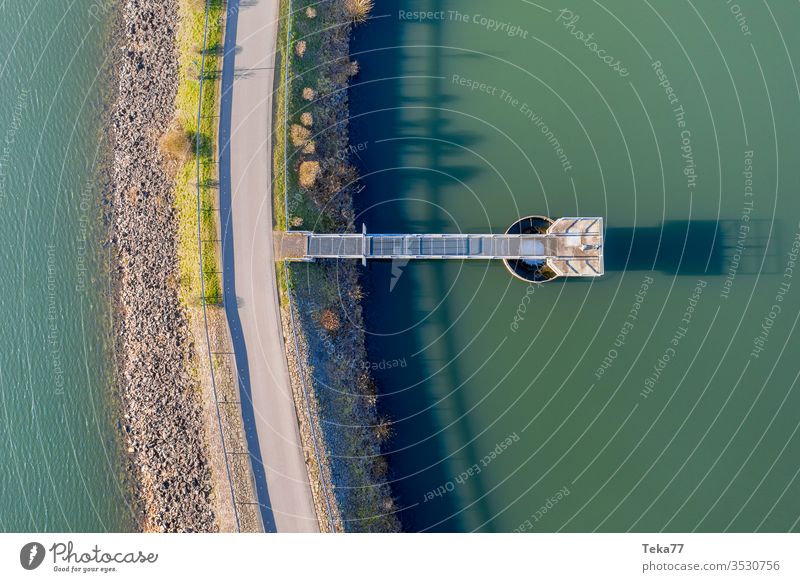 stone water dam and overflow in the sun from above big dam dam overflow overflow valve overlow from above stone dam drinking water dam dam from above