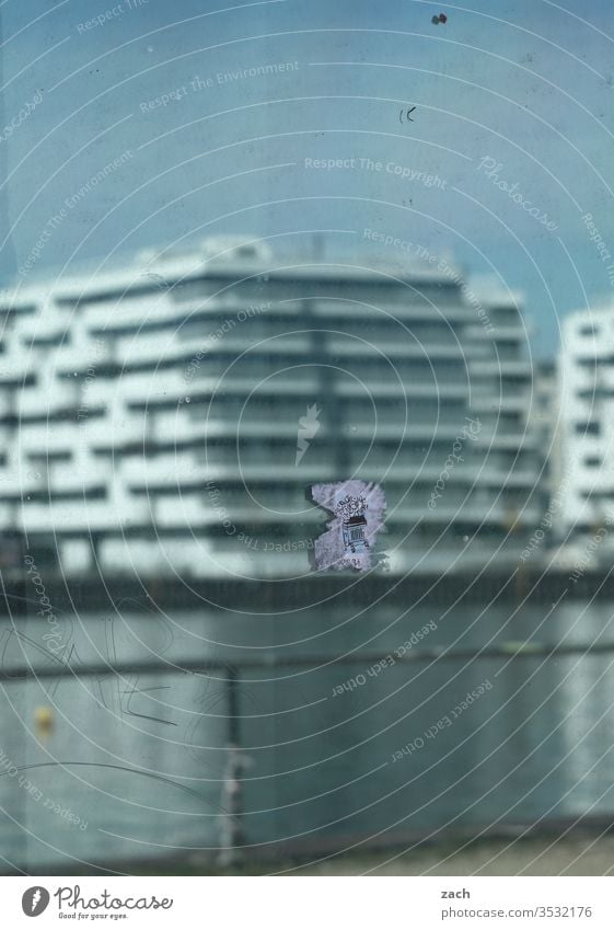 blurred view of a modern building on the waterfront mirrored in the window Berlin Mirror image Reflection reflection Blue Town House (Residential Structure)