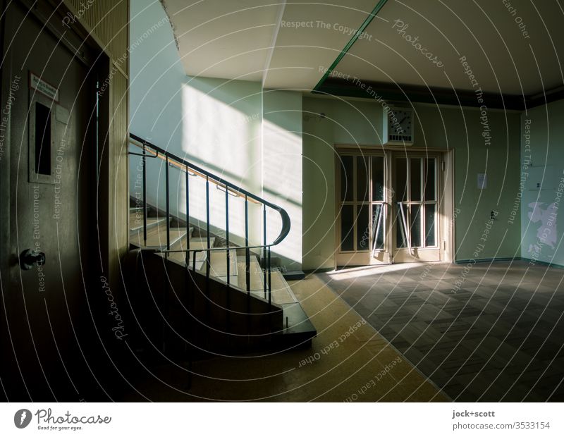 Staircase in the light, between the very top and the very bottom Stairs Shadow Lanes & trails Story Retro Style Shaft of light Architecture Banister