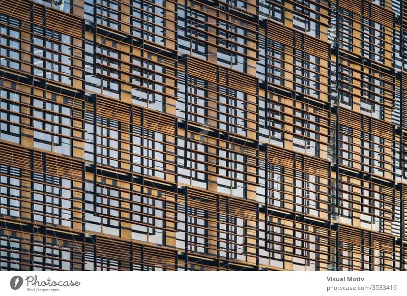 Geometric facade of a minimalist building under the last afternoon lights geometric exterior background architecture outdoors modern contemporary windows