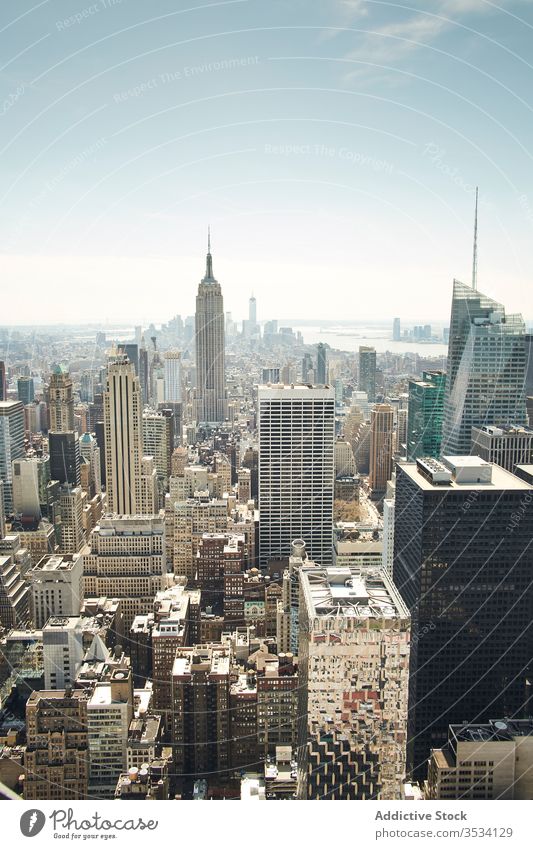 New York city view with skyscrapers and Empire State Building in sunny day modern new york building cityscape empire downtown architecture contemporary