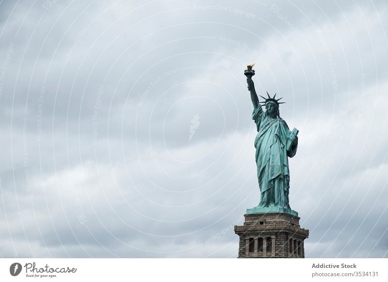 Statue of Liberty against cloudy sky statue liberty architecture symbol city landmark famous freedom new york usa america ny travel tourism attract sightseeing