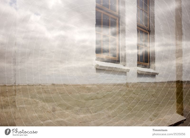 surreal | sky window Window Sky Facade Wall (building) stonewall Windowsill Lattice window Colour photo Clouds Meadow Horizon Subdued colour Double exposure