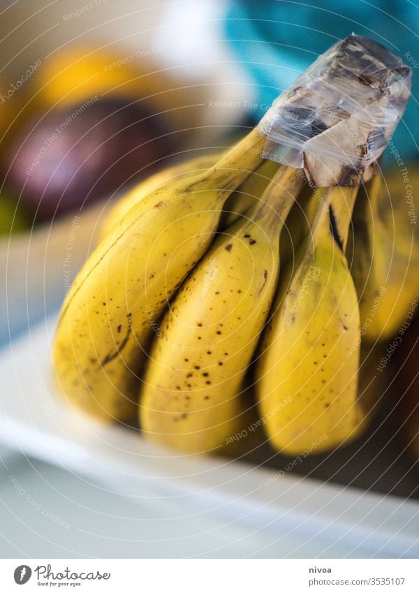 bananas Banana Bananas Fruit Lemon passion fruit Bowl Dish Kitchen Yellow close up Healthy Vitamin Close-up Citrus fruits Colour photo citrus Nutrition Lime