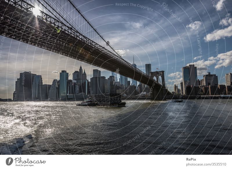 Cargo tug under the Brooklyn Bridge. Harbour harbour boats Fisherman fishing Beach beach Coast Ocean sea ocean Tide tides Summer Summer vacation coast mare