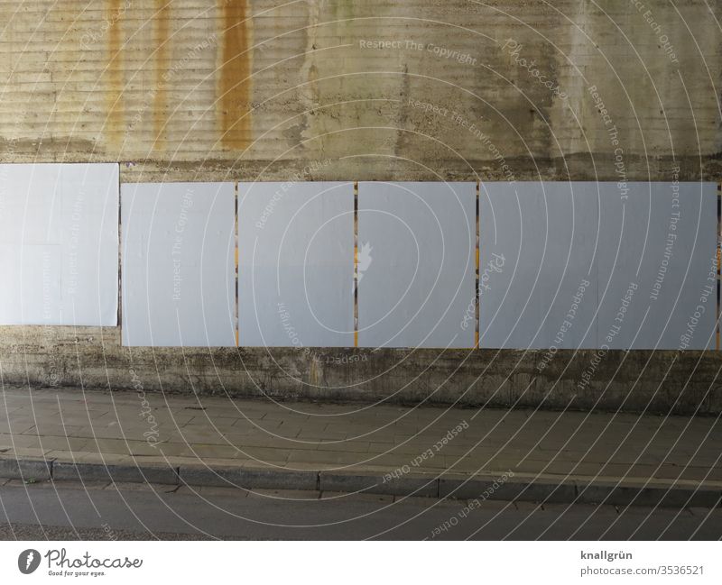 White placarded wall at the beginning of an underpass Wall (building) Underpass Wall (barrier) Tunnel Town Light and shadow Poster Neutral obliquely Street off