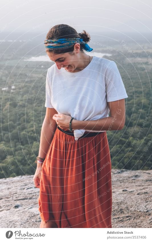 Peaceful female hipster during sunset in highlands woman travel peaceful scenic admire landscape vacation sigiriya sri lanka tranquil serene calm enjoy pleasure