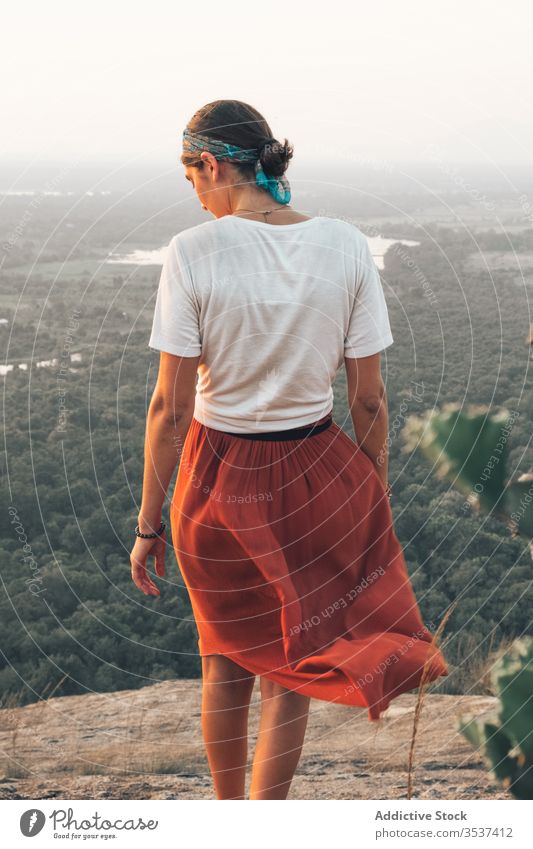 Peaceful female hipster during sunset in highlands woman travel peaceful scenic admire landscape vacation sigiriya sri lanka tranquil serene calm enjoy pleasure