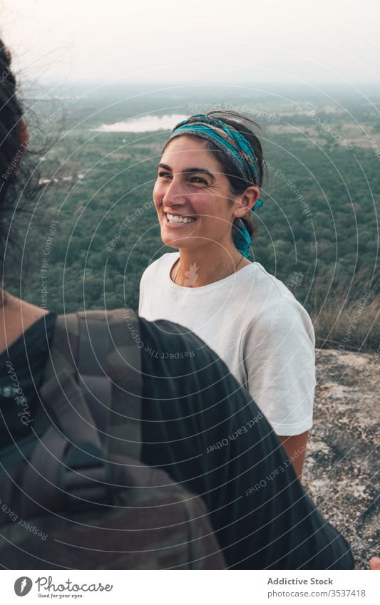 Cheerful ethnic couple of hipsters during traveling around Sigiriya valley laugh landscape adventure wanderlust cheerful traveler sigiriya sri lanka holiday