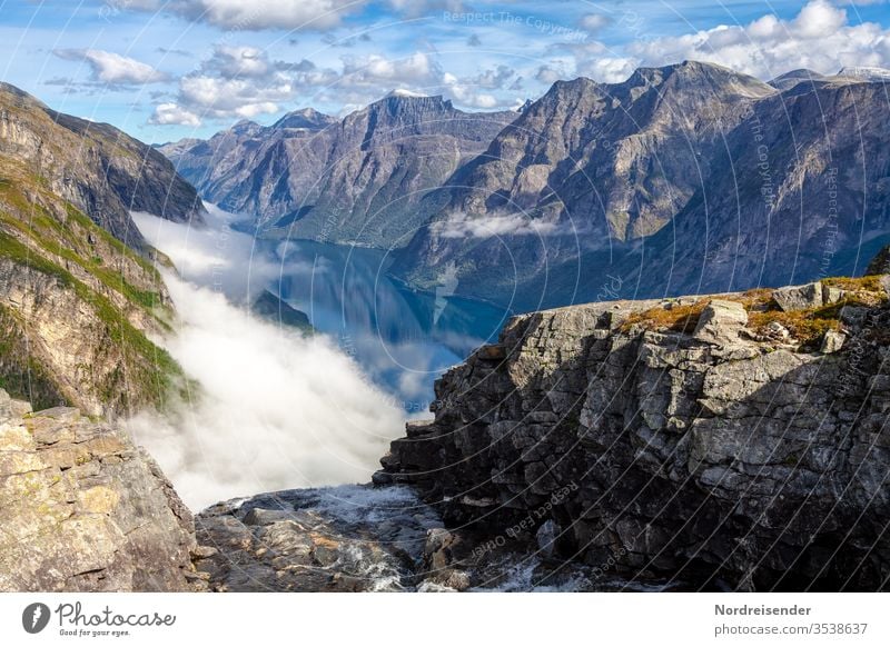 Mardalsfossen over magnificent landscape A river becomes a waterfall Waterfall Fjord mountain Norway Rock River mountains Mountain range curt Bizarre Tall Fog