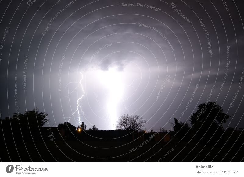 Summer night lightning Thunder and lightning Lightning thunderstorm thunderstrike Storm Power Powerful Meteorology Weather Storm clouds Exterior shot Rain Sky