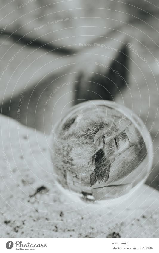 Glass ball image globe photo crystal ball image through glass On the head Sphere Round mirrored Stone Close-up stones Wall (barrier) stone pillars columns