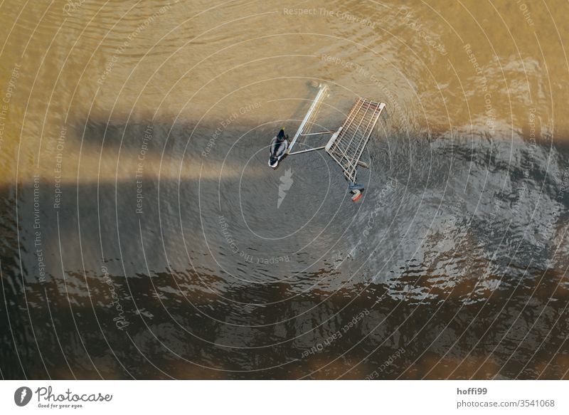 Shopping trolley in the water Shopping Trolley Environment Environmental pollution Waste management waste throwaway society Throw away Dirty Reckless