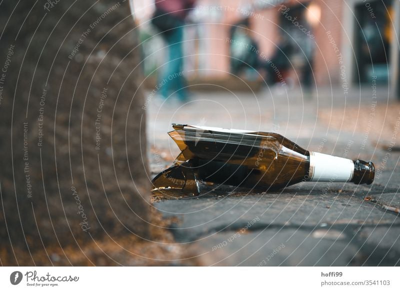 broken bottle on cobblestone shards broken glass Broken broken down Bottle of beer