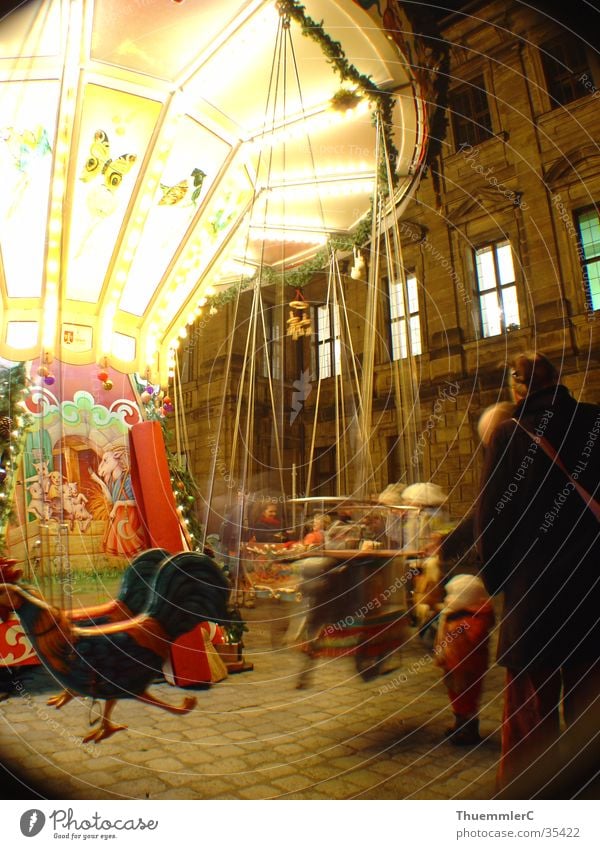 Carousel at night 2 Night Child Rotate Light Long exposure Portrait format Leisure and hobbies Joy Crisis child market Erlangen Christmas & Advent