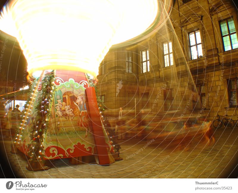 Carousel at night 1 Night Rotate Light Long exposure Landscape format Leisure and hobbies Joy Crisis child market Erlangen Christmas & Advent Christmas Fair