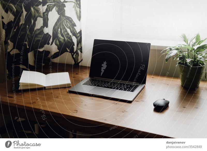 An open laptop at an old wooden table. Computer Business Keyboard office Notebook Technology Desk White Table Screen Internet Isolated pc monitor work desktop