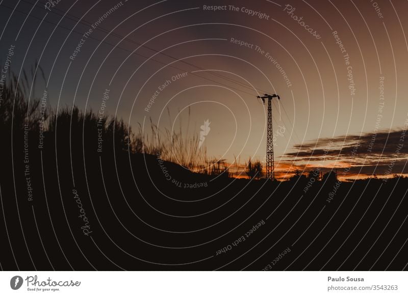 electricity pylon Electricity Electricity pylon Electrical equipment Technology Energy industry Connection Clouds Power Metal Blue High voltage power line