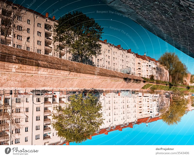 Reflection in the Landwehrkanal in Berlin Central perspective Mirror image Multicoloured Exterior shot Dawn Long shot Sunlight Light Copy Space right