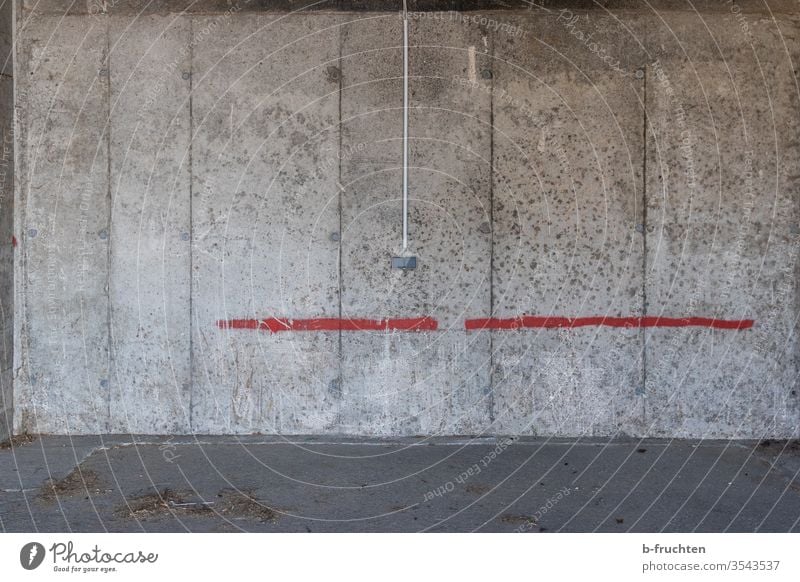 Two sockets on a concrete wall, red colour line on the concrete wall Concrete Wall (barrier) exposed concrete wall Grunge Old filthy Concrete wall Sockets