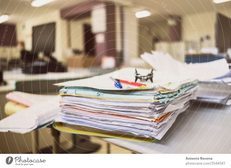 Work accumulation on desk Accumulation Office Paper Real Records Files Tampon Stamp Table Paperwork Stapler Filing no people indoors stapler job stress