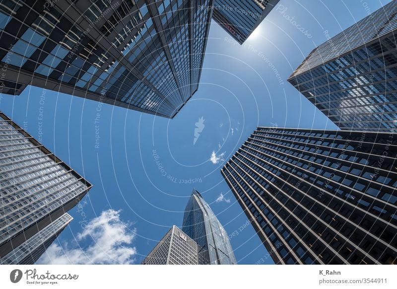 Looking up in New York. finance Quarter Town built new york Business office downtown Manhattan Architecture skyscraper Tower Sky Glass external Street Skyline