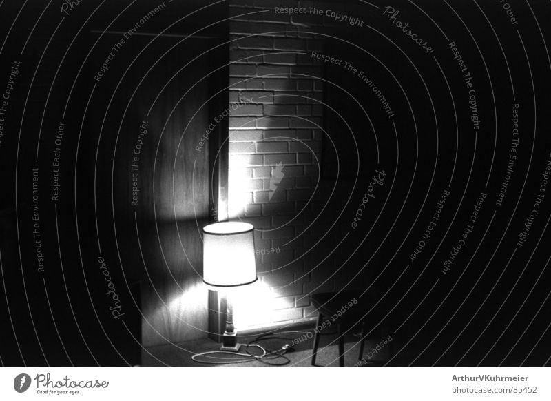 lighted room Light Lampshade Wall (building) Room Mysterious Eerie Night Wall (barrier) Living or residing Black & white photo Shadow