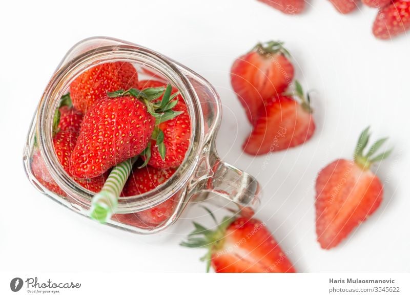 Glass jar full of strawberries, concept fruit smoothie, healthy juice background berry bowl closeup cocktail copy space delicious dessert diet drink food fresh