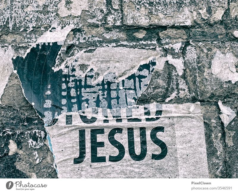 Graffiti on the wall with the theme Jesus Belief Religion and faith Exterior shot Jesus Christ Christianity Symbols and metaphors Catholicism