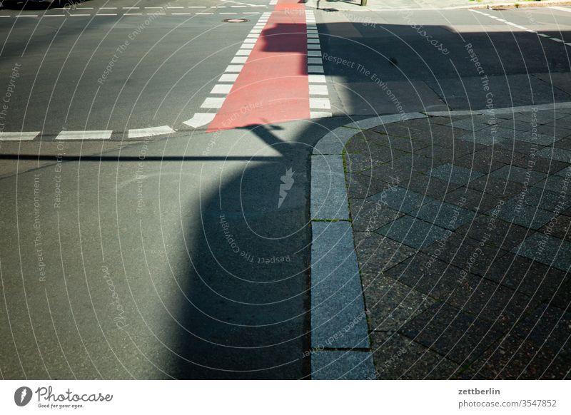 Crossing with bicycle path Cycle path Asphalt cross Street Crossroads Corner Lane markings Clue edge Curve Line Left navi Navigation Orientation Right Direction