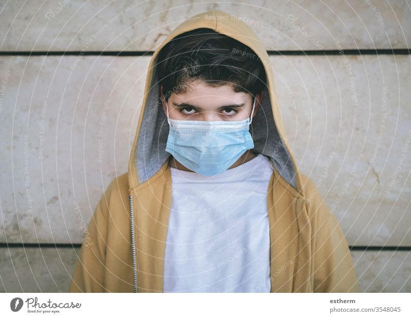 Coronavirus,angry boy with medical mask coronavirus Child Virus Epidemic pandemic Meditative Boy (child) Quarantine covid-19 Symptom medicine Healthy Death