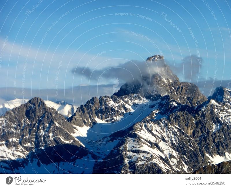 View from the foghorn... mountain Alps allgau Allgäu Alps cloud Weather Landscape rock massif overcast Peak snow-covered Mountain Winter Nature Loneliness