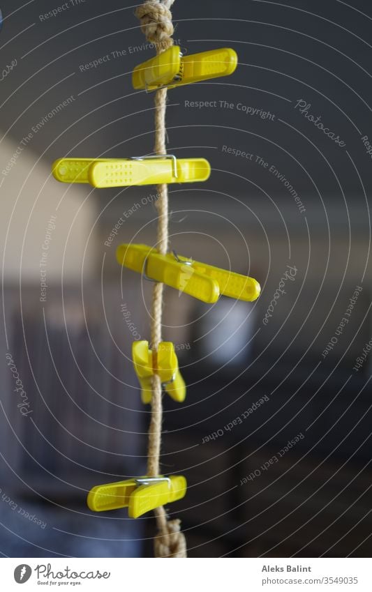 Yellow clothespins #clothes pegs Clothesline Exterior shot Colour photo Deserted hang Washing Dry Hang up