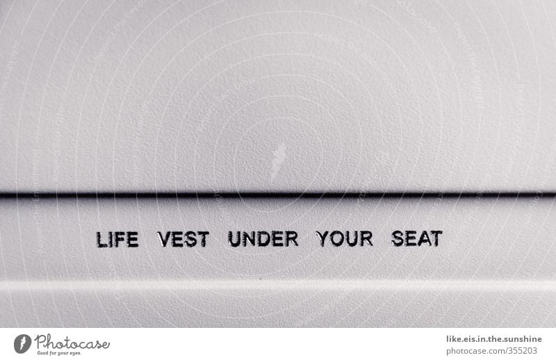 Life vest under your seat Vacation & Travel Tourism Trip Adventure Far-off places Sightseeing Aviation Airplane Passenger plane In the plane Tall Life jacket