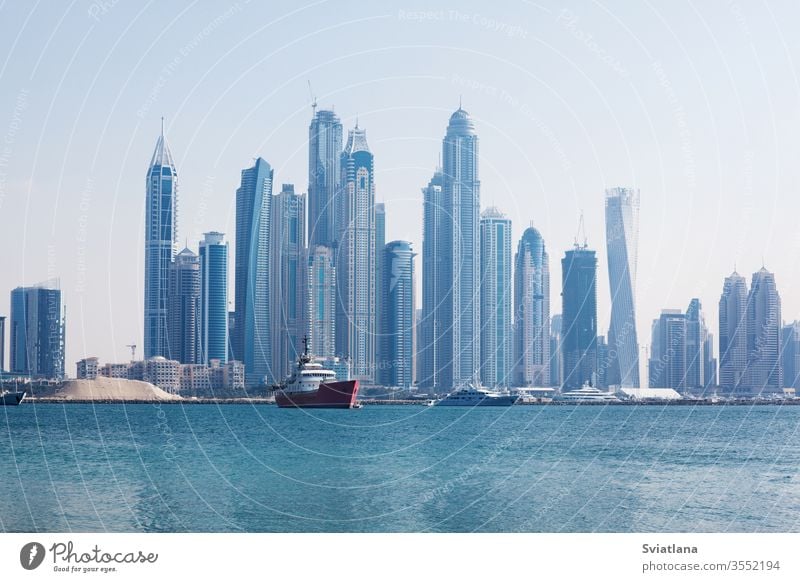 Beautiful view of the skyscrapers in Dubai at dawn. UAE jbr blue waters island arabic architecture background bay beach bridge building buildings business