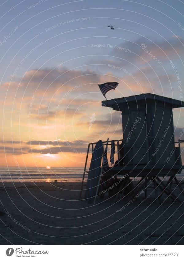 baywatch Ocean Beach California Sunset Clouds Surfboard rescue swimmer July 4th american flag