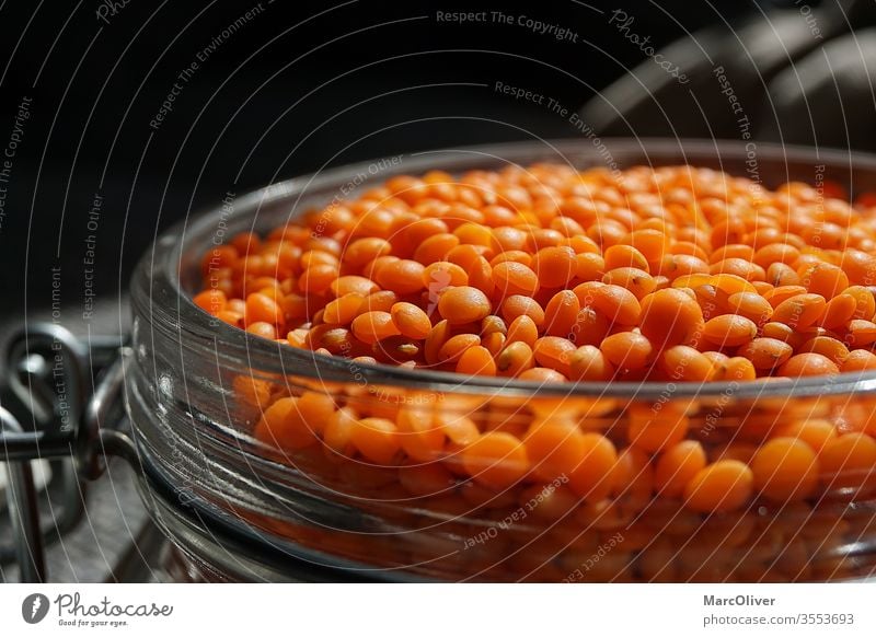 Red lenses in a glass red lenses Lentils Lenses of glass Food Vegetarian diet Colour photo Nutrition Organic produce Vegan diet Diet Studio shot Design