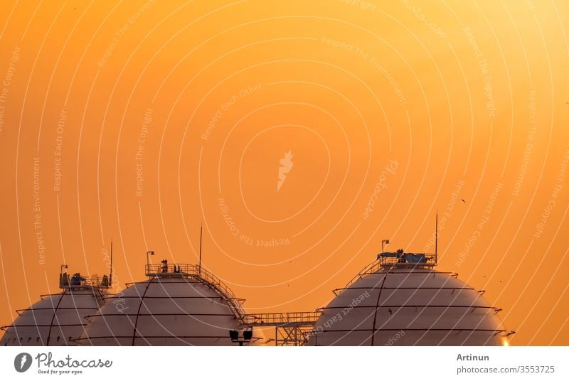 Industrial gas storage tank. LNG or liquefied natural gas storage tank. Spherical gas tank in petroleum refinery. Above-ground storage tank. Natural gas storage industry and global market consumption