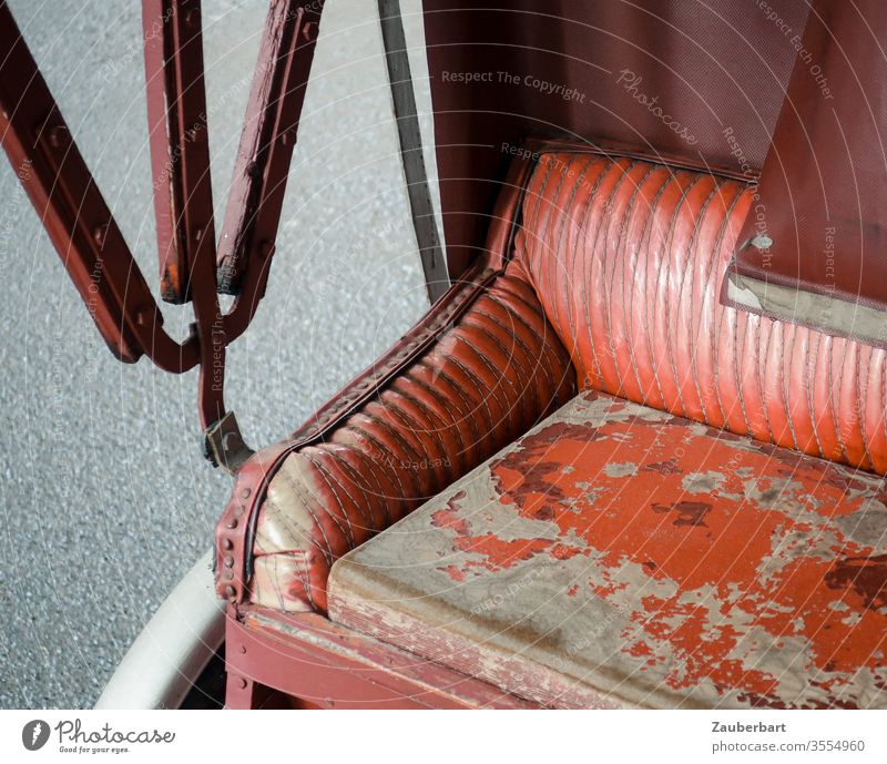 Red bench and hood of a bicycle rickshaw, slightly worn Rickshaw Bicycle Bench Bolster Convertible roof abraded Second-hand Old Transport Passenger traffic