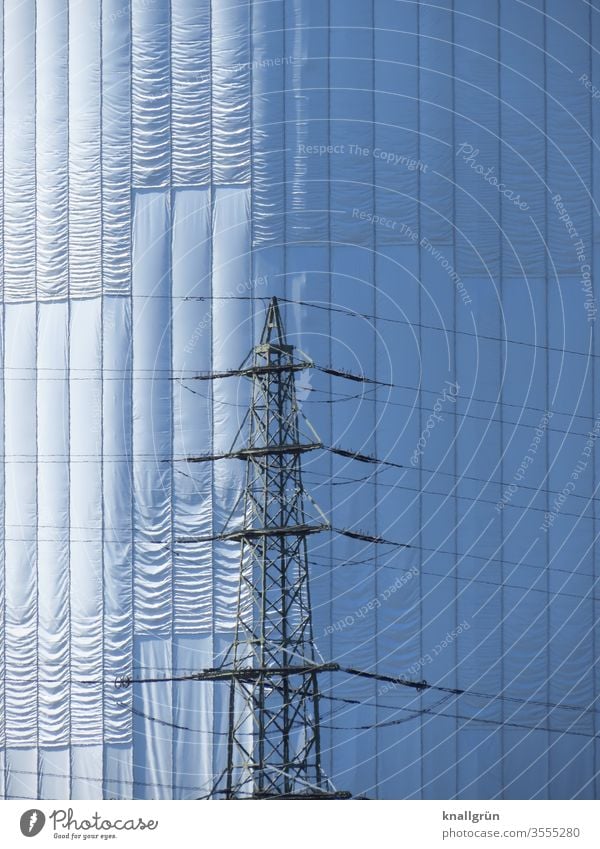 Close-up of the veiled gasometer in Oberhausen, in front of it an overhead line mast Gasometer Industry shrouded Exterior shot Manmade structures Industrial