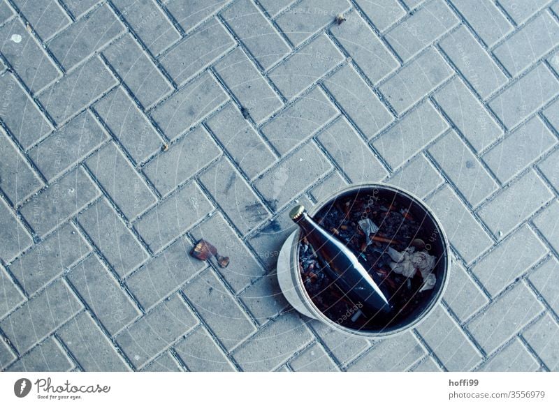 View from above on ashtray with beer bottle Ashtray Throw away Cigarette Butt Dirty Trash waste tilt tilt express Glass Addiction Spirits broken down Dependence